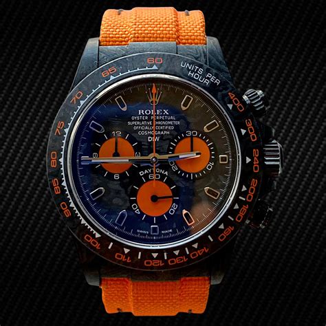 rolex with orange face.